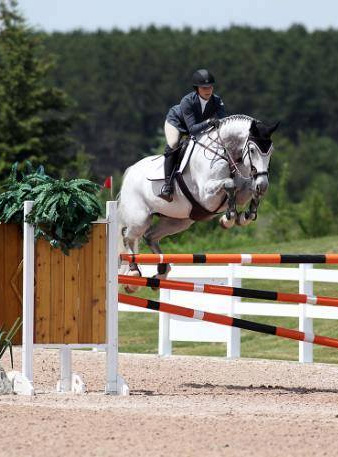 Veronica Bot and Calators Charles - 2014 Canadian 1.40m Jr/Am Champion - Chris Delia Stables is a full-service 'A' circuit show barn offering individualized coaching programs for hunter, jumper and equitation riders.